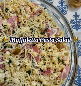 Muffuletta Pasta salad with chopped salame, mortadella, olive salad and pasta.