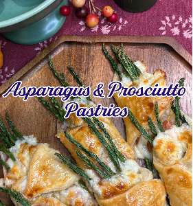golden puff pastry wrapped around asparagus and prosciutto